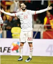  ??  ?? Isco celebrates after scoring his hattrick in Madrid on Tuesday