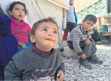  ??  ?? Syrian refugee children have emotional scars that will take a lifetime to heal.