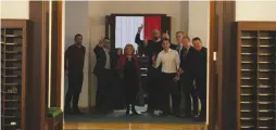  ?? (Slawomir Kaminski/Reuters) ?? OPPOSITION MEMBERS of the Polish parliament show victory signs in front of the main chamber in Warsaw on Tuesday.