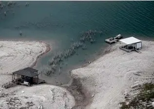  ?? Jerry Lara / Staff photograph­er ?? Medina Lake’s water level has been falling over the past year. Rain in the area has been scarce for the past two years. And in San Antonio, less than 3 inches has fallen in 2021’s first three months.