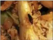  ?? SUBMITTED IMAGE ?? A woman claims a dead roach, pictured in the food, was found in her takeout order from No. 1 China restaurant in Ewing on Tuesday.