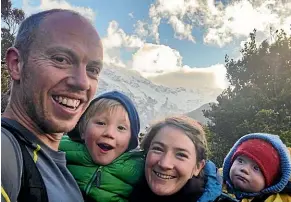  ??  ?? Emmanuel Oyston and Anna Star, along with children Fergus, 5, and Quintin, 2, have taken up the reins as the new Department of Conservati­on resident rangers on Maud Island in Pelorus Sound.