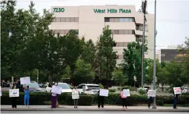  ?? Photograph: Frederic J Brown/AFP/Getty Images ?? Nurses stage a protest with support from the registered nurses union, SEIU Local 121RN, outside the West Hills Hospital on 18 June in West Hills, California.