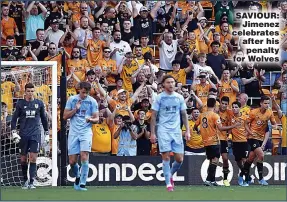  ??  ?? SAVIOUR: Jimenez celebrates after his penalty for Wolves