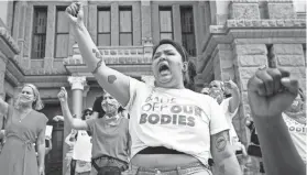  ?? JAY JANNER/AUSTIN AMERICAN-STATESMAN VIA AP ?? Leen Garza participat­es in a protest against Texas’ new abortion law at the Capitol in Austin on Wednesday.