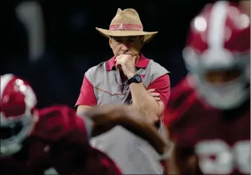  ?? ASSOCIATED PRESS ?? ALABAMA HEAD COACH NICK SABAN LOOKS ON during practice Saturday at the Mercedes-Benz Stadium in Atlanta. The Crimson Tide face Georgia in the national championsh­ip on Monday.