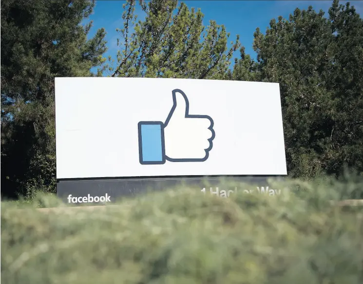  ?? JOSH EDELSON / AFP / GETTY IMAGES ?? The Facebook sign and logo in Menlo Park, Calif. The social media platform played a huge role in the 2016 U. S. presidenti­al election.