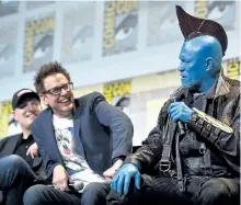  ?? ALBERTO E. RODRIGUEZ/GETTY IMAGES ?? Marvel Studios president and producer Kevin Feige, director James Gunn and Yondu (Michael Rooker) from Marvel Studios’ Guardians Of The Galaxy Vol. 2, attend the San Diego Comic-Con Internatio­nal 2016 Marvel Panel.