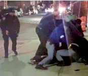  ??  ?? In this image made from video, New York City police officers forcefully arrest 20-year-old Fitzroy Gayle in the Brooklyn borough of New York. — AP