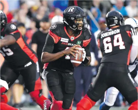  ?? CANADIAN PRESS ?? Offensive co-ordinator Jaime Elizondo says several areas still need fine-tuning for the Redblacks, here being led by QB Dominique Davis.