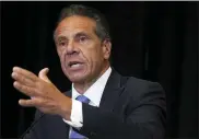  ?? RICHARD DREW, FILE - THE ASSOCIATED PRESS ?? New York Gov. Andrew Cuomo speaks during a news conference at New York’s Yankee Stadium, July 26. Investigat­ors conducting an inquiry into sexual harassment allegation­s against Cuomo questioned him for eleven hours when he met with them last month, The New York Times reported Monday, Aug. 2.