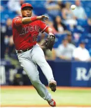  ?? AP PHOTO/CHRIS O’MEARA ?? Los Angeles Angels third baseman Luis Valbuena throws out Tampa Bay Rays’ Kevin Kiermaier during their May 25, 2017, game in St. Petersburg, Fla. Valbuena, 33, and Jose Castillo, 37, were killed in a car crash in Venezuela. Both were playing for Cardenales de Lara in the Venezuelan league.