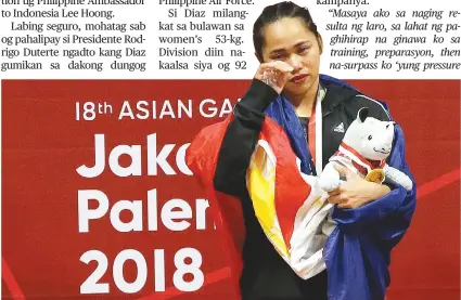  ?? / AP PHOTO ?? ■ GOLD: Nakahilak si Hidilyn Diaz human siya nakalangka­t og gold medal sa Asian Games sa Jakarta, Indonesia sa miaging gabii. Gibanabana­ng moabot sa kapin sa P6 million ang insentibo nga madawat ni Diaz human misaad si President Rodrigo Duterte nga mohatag sab kini og pahalipay sa lumad nga taga Zamboanga City.