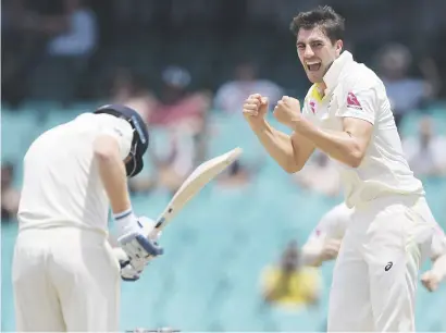  ?? Picture: AFP ?? ANOTHER SCALP. Australian paceman Pat Cummins celebrates dismissing England’s Jonny Bairstow on the final day of the fifth Ashes Test in Sydney yesterday.