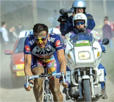  ??  ?? Two-time winner Franco Ballerini is the archetypal Roubaix rider