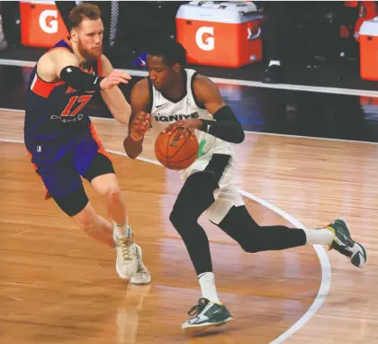  ?? MIKE EHRMANN/GETTY IMAGES FILES ?? After skipping college to play for the G League Ignite, Jonathan Kuminga, seen driving to the basket during action back in February, was expected to be a top 10 pick in this year's NBA draft. The Congo native's family was able to travel from Africa to join him on draft night thanks to the efforts of NBA “visa guy” Travis Murphy. In total, Murphy worked with 35 draft prospects and their families ahead of the draft.