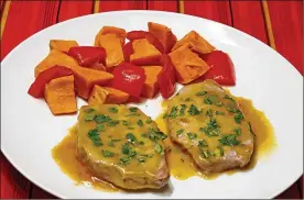  ?? LINDA GASSENHEIM­ER / TRIBUNE NEWS SERVICE ?? Maple-Glazed Pork Chops.