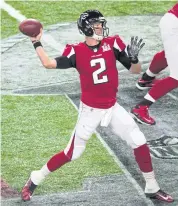  ??  ?? Falcons quarterbac­k Matt Ryan attempts a pass against the Patriots during the 2017 Super Bowl.