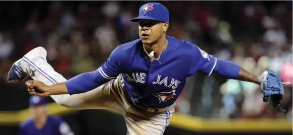  ?? MATT YORK/THE ASSOCIATED PRESS ?? Jays right-hander Marcus Stroman limited Arizona to one run in eight innings, and showed off some athletic skill with a rare chance to run the basepaths in a National League park.