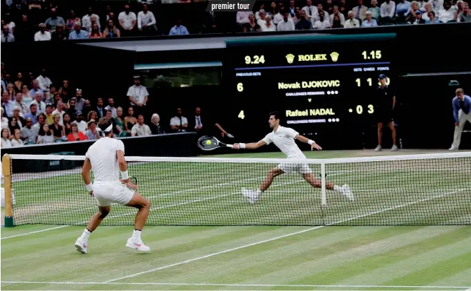  ?? ?? Novak Djokovic et Rafael Nadal, en demi-finales de Wimbledon 2018. Le Serbe l’avait emporté 10-8 au cinquième set.