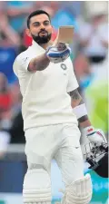  ??  ?? Ton up: India’s Virat Kohli hails his century against England