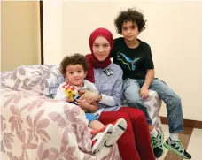  ?? Chris Whiteoak / The National ?? Shahenda Al Bakri with her sons Aly Al Kady, 7, and Abd Elrahman Al Kady, 2