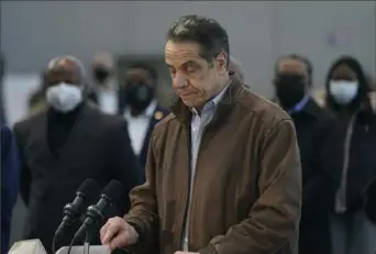  ?? Seth Wenig/Associated Press ?? New York Gov. Andrew Cuomo speaks at a vaccinatio­n site Monday. As calls for Mr. Cuomo to resign continued to grow, a lawyer for the governor said Thursday she reported a groping allegation against him to police after the woman involved declined to press charges herself.