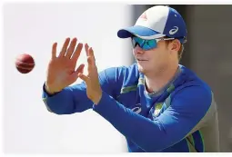  ??  ?? Australia's captain Steve Smith catches the ball during a practice session at the Jharkhand State Cricket Associatio­n Stadium, Ranchi, on Wednesday. (Reuters)