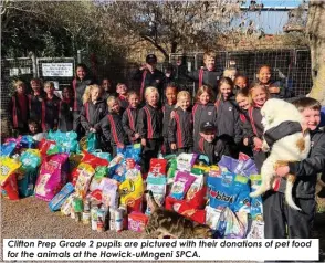  ?? ?? Clifton Prep Grade 2 pupils are pictured with their donations of pet food for the animals at the Howick-uMngeni SPCA.