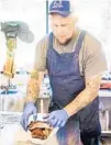  ?? GIT-N-MESSY BBQ/COURTESY ?? Chuck Cobb is a one-man barbecue show inside the Sanford Express gas station.