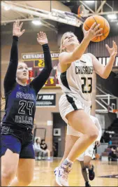  ?? Bizuayehu Tesfaye Las Vegas Review-journal @btesfaye ?? Faith Lutheran guard Raina Forgue drives past Spring Valley’s Delaney Bartlett for two of her 26 points.