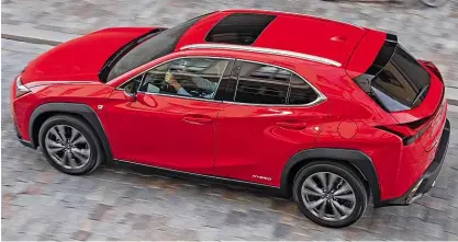  ??  ?? UX follows the current trend for coupé-suv styling, although the sloping roofline has little impact on headroom in the rear