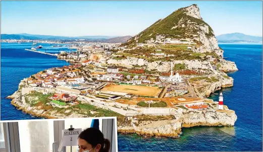  ??  ?? ROCK AND ROLLOUT: The British Overseas Territory is way ahead in race to vaccinate, thanks to the RAF. Inset: A woman gets her Covid jab in Gibraltar