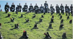 ?? DEAN BROUGHTON/PNG ?? Hundreds of boots cover the grounds of the Vimy Memorial in France on Sunday to commemorat­e the nearly 3,600 Canadians who died on the first day of the Battle of Vimy.