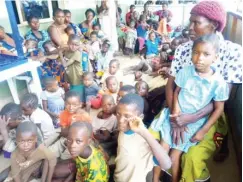  ??  ?? Children waiting to be attended to by health experts