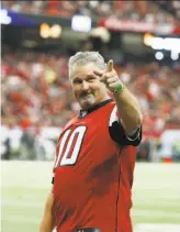  ?? Butch Dill / Associated Press 2016 ?? Cal alum Steve Bartkowski is recognized by Atlanta fans during a 2016 game. The Falcons made Bartkowski the No. 1 draft pick in 1975. He spent 11 of his 12 NFL seasons with Atlanta.