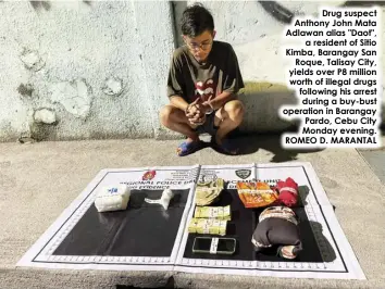  ?? ROMEO D. MARANTAL ?? Drug suspect Anthony John Mata Adlawan alias "Daot", a resident of Sitio Kimba, Barangay San Roque, Talisay City, yields over P8 million worth of illegal drugs following his arrest during a buy-bust operation in Barangay Pardo, Cebu City Monday evening.