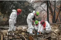  ?? Eric Thayer / New York Times ?? Search and rescue teams look through burned houses for the remains of wildfire victims Saturday in Paradise, Calif.
