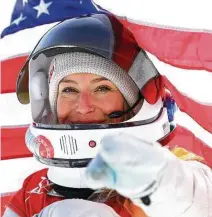 ?? Cameron Spencer / Getty Images ?? Jamie Anderson of the United States had plenty of cause for celebratio­n during the victory ceremony for the Snowboard Ladies’ Slopestyle Final, having defended her gold medal.