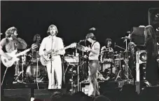  ?? Lawrence Reichman / Associated Press 1977 ?? Mickey Hart (second from right), plays with the Grateful Dead at Cornell University in 1977.