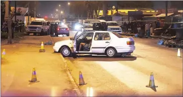  ?? Picture: PHANDO JIKELO ?? CRIME SCENE: Friends who were sitting in a VW Jetta about 200m from Nyanga Police station were shot and killed on Wednesday night.