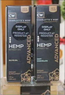  ??  ?? Boxes of Hemp Extract Oil are displayed during a Kimberton Whole Foods workshop. The supermarke­t chain carries Charlotte’s Web hemp products which are used for everyday stresses and to promote healthy recovery from exercise.