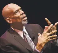  ?? Catherine Avalone / New Haven Register ?? NBA legend Kareem Abdul-Jabbar is interviewe­d by political sportswrit­er Dave Zirin in 2017 at Southern Connecticu­t State University.