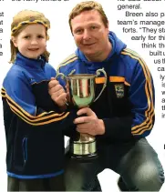  ?? Goalkeeper Mike Moriarty with his neice Aoibhéann Taylor during the visit by the team to Cullina National School ??