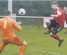  ??  ?? Michael Charlton leaps to hit Sunderland RCA’s second goal against Shildon