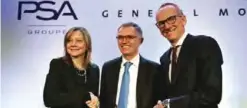  ??  ?? PARIS: This file photo shows (from left) the chairwoman and CEO of General Motors Company Mary T Barra, the chairman of the managing board of French carmaker Groupe PSA Carlos Tavares and Opel CEO Karl-Thomas Neumann shaking hands during a press...