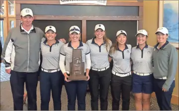  ?? Contribute­d ?? Berry College’s women’s golf team poses with the Southern Athletic Associatio­n championsh­ip trophy after winning the conference tournament in Dickson, Tenn.