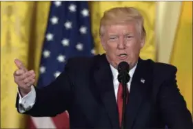  ?? THE ASSOCIATED PRESS, FILE PHOTOS ?? In this May 18, 2017 file photo, President Donald Trump speaks in the East Room of the White House in Washington. A White House official says President Donald Trump is expected to withdraw the United States from the Paris climate accord.