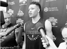  ?? STEPHEN M. DOWELL/STAFF PHOTOGRAPH­ER ?? Kevin Knox, who averaged 15.6 points per game on 44.5 percent shooting in his one and only season at Kentucky, talks with reporters after Tuesday’s workout.