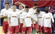  ?? — AP ?? A win against Leverkusen would send Leipzig to the top.